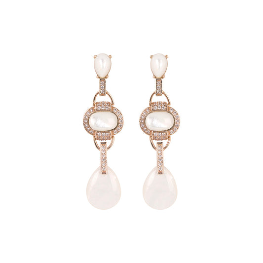 a pair of pearl earrings